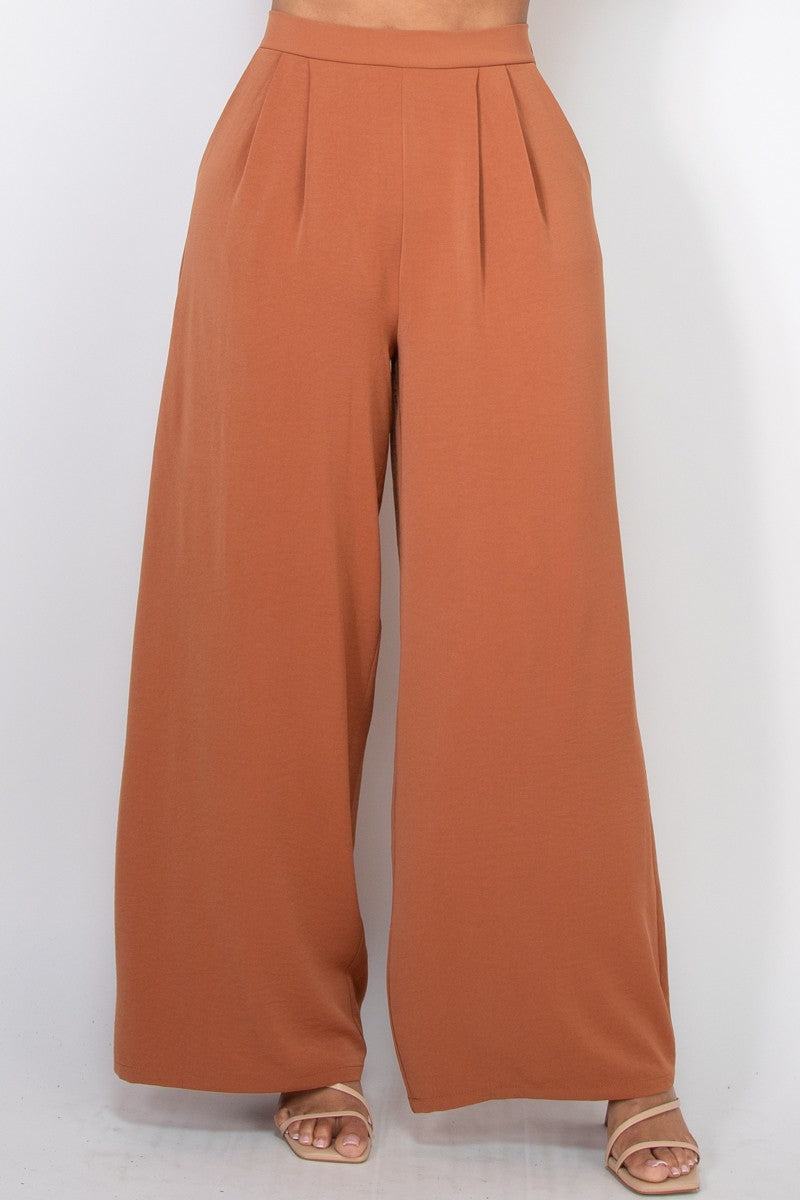 Pantalones amplios de tiro alto con pliegues